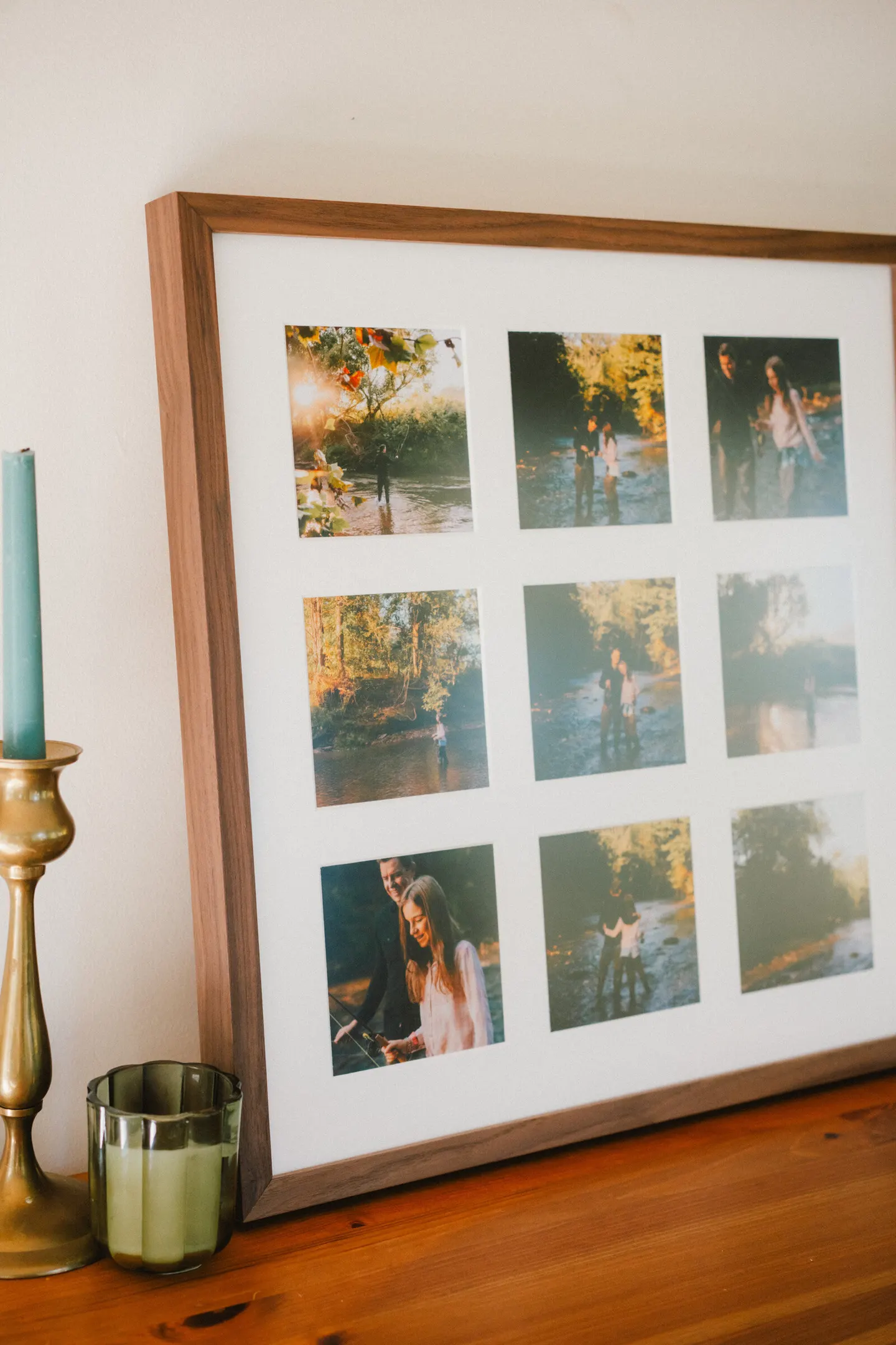 Framed grid of fly-fishing engagement photos displayed on a mantel
